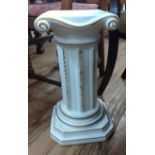 Small jardiniere stand in white in the Roman style