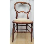 An antique Beech wood balloon back chair 84cm high, 40cm wide.