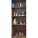 Ceramic animals and birds by various makers including Denton, Wade, Sylvac, and Beswick. (22)