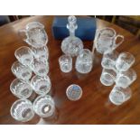 A set of eight Waterford cut glasses 8.5cm high, glass by other makers including Wychbury Crystal (