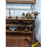 A copper lamp on wrought iron stand 120cm high, other cast metal and brass oil lamps