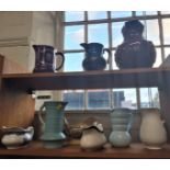 Nine ceramic jugs including Lovatts deco jug and a pale turquoise art deco jug (9)