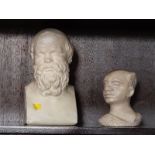 After the Antique. Two busts. One in marble the other is plaster of Paris.