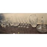 A Baccarat bottle -shaped decanter 26cm, and eight Baccarat Champagne flutes, four cut glasses,