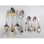 Four old English pattern table spoons, Four fiddle pattern teaspoons, and a salt spoon.