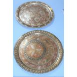 Two Indian circular dishes with abstract floral designs. 40cm (2)