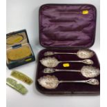 A boxed set of silver-plated berry spoons and a gentleman's hairbrush and comb set in original case.