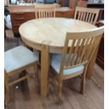 A 20th century dining table and chairs. 76 x 110 x 110cm