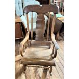 An Antique rocking chair. Circa 1920. 110cm x 60cm x 70cm