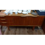 A 20th century sideboard. McIntosh 76cm 130cm x 40cm