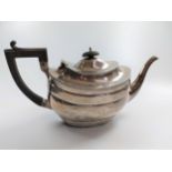 A sterling silver teapot Chester 1795 marks rubbed. 395g