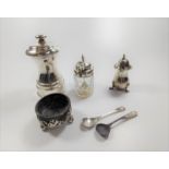 Cruets: a silver coloured metal modern pepper mill, an antique salt container (no liner) and spoon,