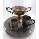 Pewter charger, two mugs and a trophy