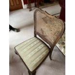 A rattan back bedroom chair. circa 1920.