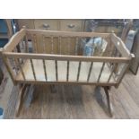 A Vintage child's cradle. 90cm x 92cm x 52cm