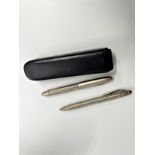 Porsche Design Roller ball pen and propelling pencil set in case. Silver with a palladium coating