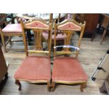 A pair of Victorian salon chairs. (2)