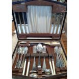 A part canteen including dessert knives, dessert forks, dessert spoons, serving spoons, tea