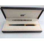 A Mont Blanc Rollerball pen. Together with an additional cartridge and box.