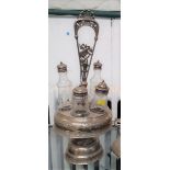 A Victorian Silver Plated Cruet Stand. Circa 1870. One bottle lacking.