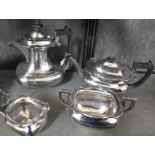 A silver-plate four-piece tea set