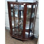 A Glass front display cabinet, circa 1930's. 116cm x 88cm x 39cm.