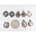Silver watch chain medallions and a Victorian crown 1891. 111gms all in
