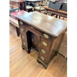 An Early George III Mahogany Kneehole Desk. Circa 1760. Of small proportions. Oak lined. Fitted with