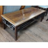 A Chinese Rosewood Coffee Table. Circa 1920. Of rectangular form. 41cm x 126cm x 56cm.