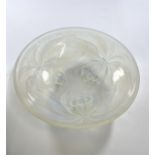 A Vaseline glass bowl. Circa 1930. In the style of Lalique. 23.5cm diameter. Signed G. Vallon. The