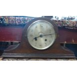A 1930's Balloon Mantel Clock. With silvered dial and Arabic numerals.