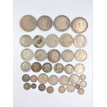 Silver coins 300gms. Victorian to george V. Including crowns half crowns and two shilling pieces.