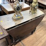 A George III Oak Gate Leg Table. In need of restoration.