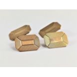 A pair of rectangular 9ct gold cuff links, 4.4gms