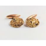 A pair of oval 9ct gold cuff links, 3.92gms