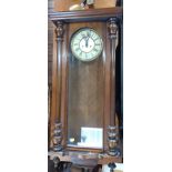 A Vienna Wall Clock. Circa 1890. With two weights and a pendulum.