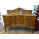 A large sideboard by Marsh's of Kentish Road, NW1: fitted with three drawers including a cutlery