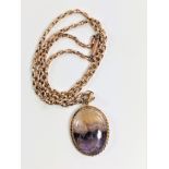 A Blue John set pendant necklace. Circa 1900. 5.55 grams of weighable high carat yellow metal.