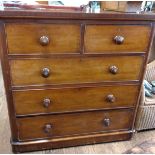 A large Victorian mahogany chest of drawers, fitted with two short over three long graduated