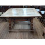 An unusual Swiss Oak centre table. late 19th century. With solid top and four heavy legs.
