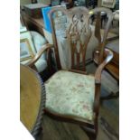 Six Chippendale Style Mahogany Dining Chairs, with ornate spal backs. (two are carvers)