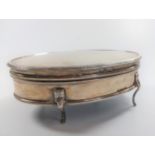 A sterling silver oval ring box, London 1915. with velvet interior.