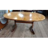 A G-Plan oval table 74cm x 162cm x 106cm (extra leaf 47cm)