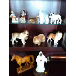 A Minton Sheikh figure 25cm with wood stand, six ceramic dogs including Sylvac, horse and a pair