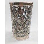 A white metal and glass beaker. circa 1900. apparently un marked. 11.5cm high.