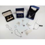 A collection of costume jewellery including a Swarovski necklace, boxed with certificate,