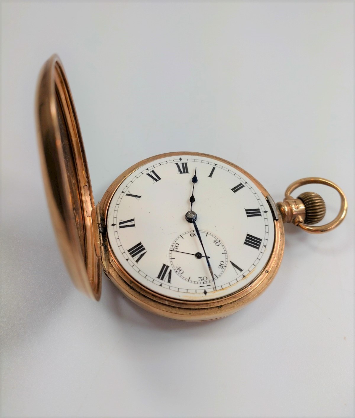 A Dennison watch Co. 9ct gold half hunter. Birmingham 1922. The 40mm white enamel dial with Roman - Image 2 of 2