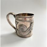 An Antique Cantonese silver coloured metal Mug. Circa 1900. Heavily applied with a Dragon.