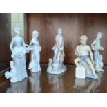 Four Spanish figures of farm hands 15cm to 17cm high and boy seated with model yacht (5)