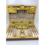 A cased set of dessert knives and forks. With mother of pearl handles.